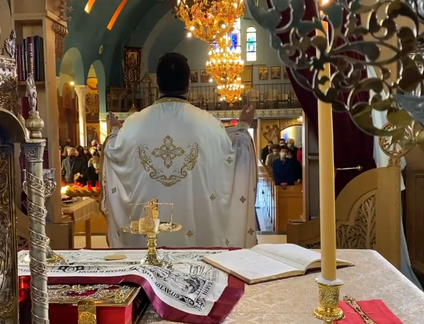 Priest blessing the congregation